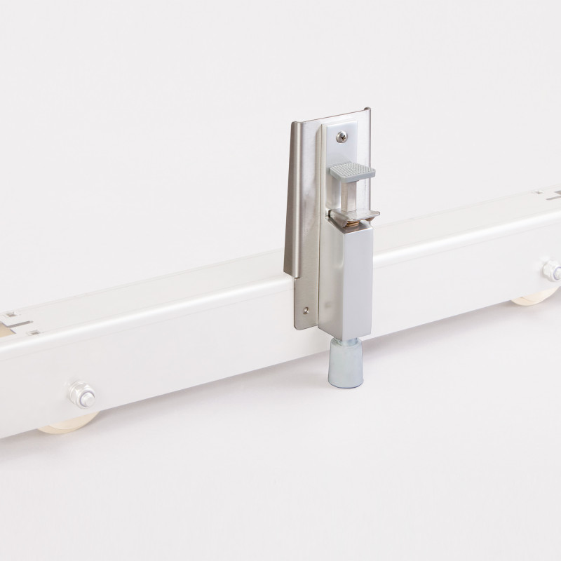 Frein au pied pour caisson mobile